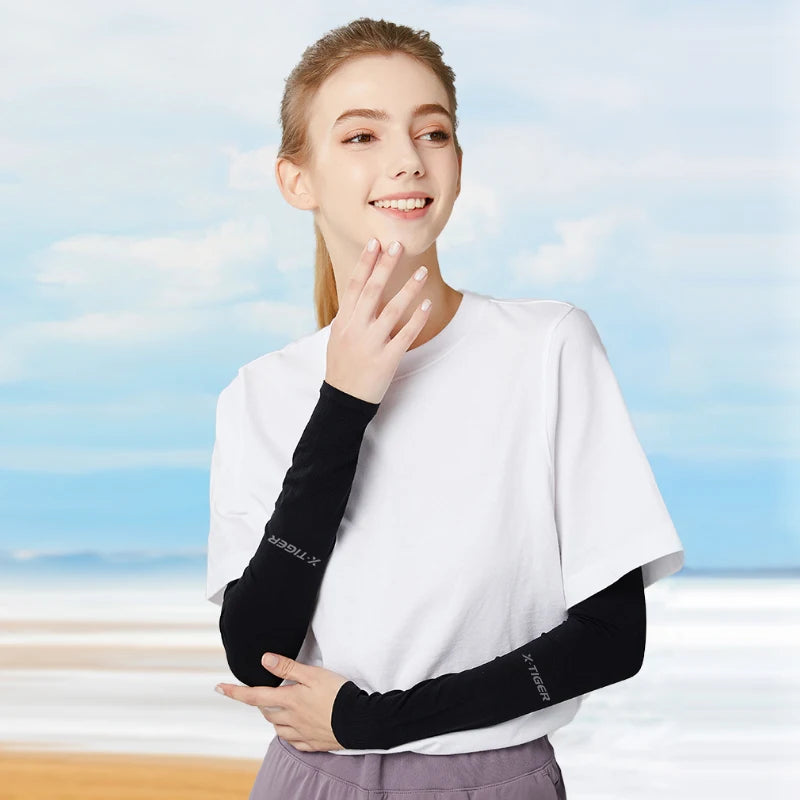 Fitness Unisex TIGER Cycling Arm Sleeves Anti-UV Black Colour shown wear by a young lady that is smiling No thumbhole