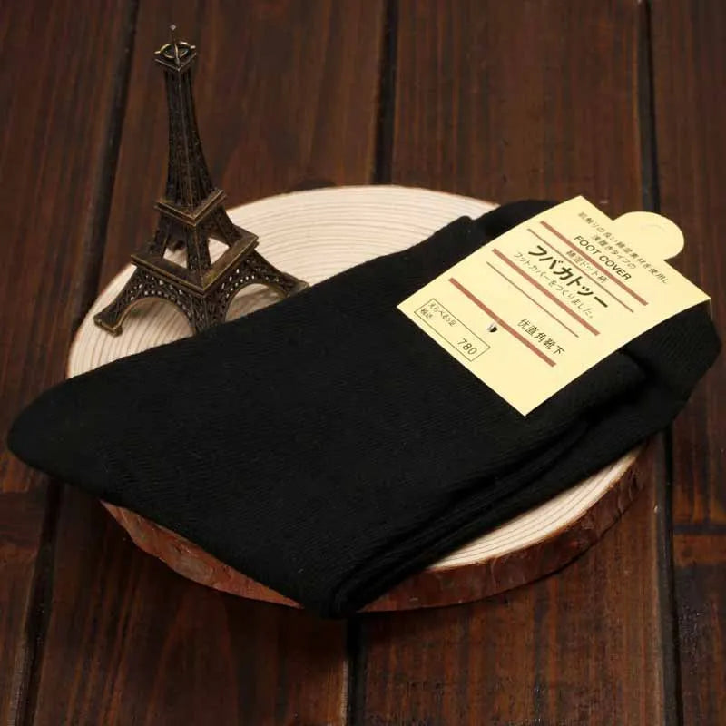 Health care products Diabetic Socks Unisex 1 pair shown Black Colour on a plate with small Eiffel Tower near
