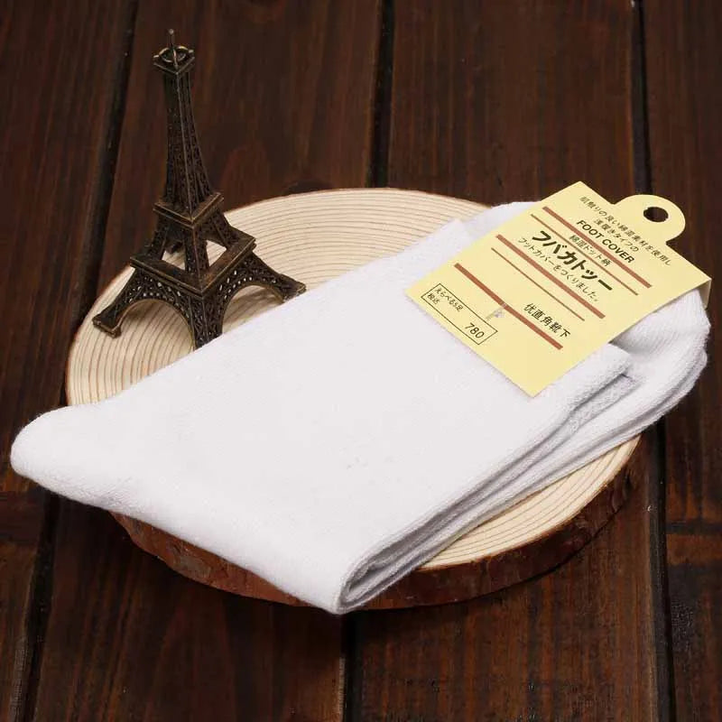 Health care products Diabetic Socks Unisex 1 pair shown White Colour on a plate with small Eiffel Tower near