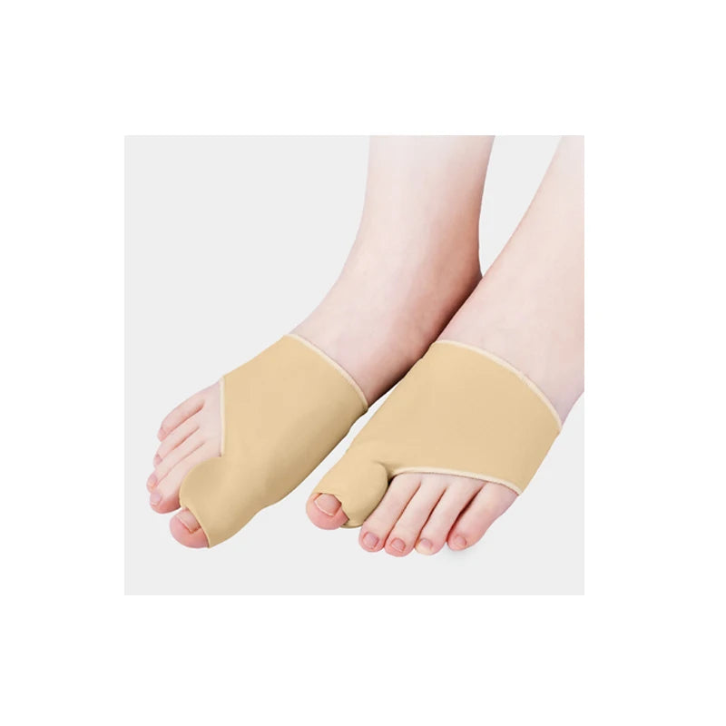Health care products Orthopaedic Big Toe Straightener Corrector wear on a woman right and left feet Beige Colour tissue