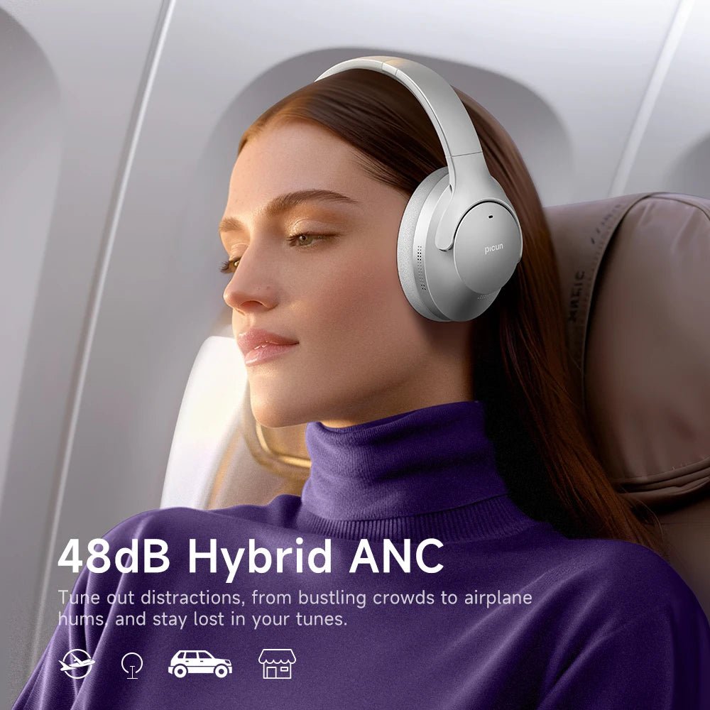 JEM Wellness Interior Noise Cancelling silver Colour Headphones Bluetooth 5.4 wear by a woman in a plane
