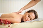 JEM Wellness Massage Therapy Collection Picture of a woman being massage in the back.