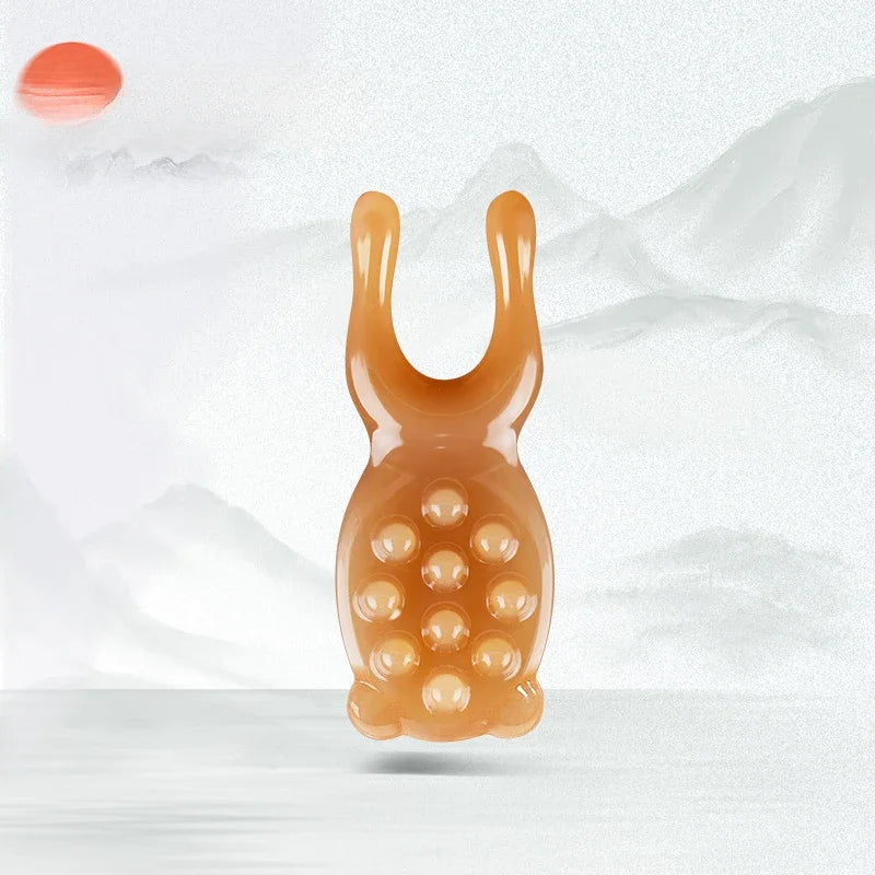 Massage Therapy Facial Massager Scraping Resin The 10 acupuncture points Orange colour tool shown