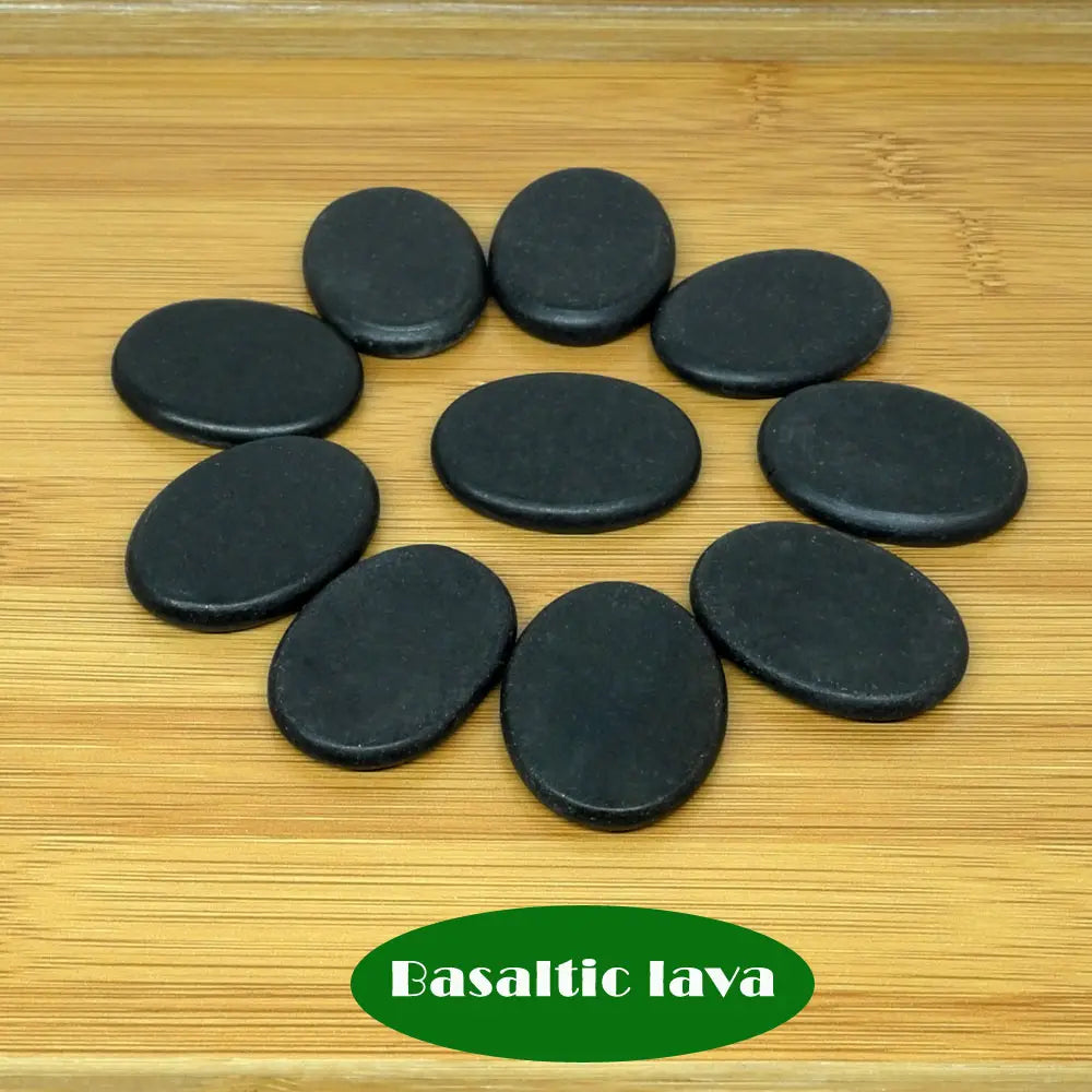 Massage therapy Jade Quarts Natural Stone set (10 Pieces 3 x 4 cm)  picture of 10 dark green stones Basaltic lava offers with a table of wood in background