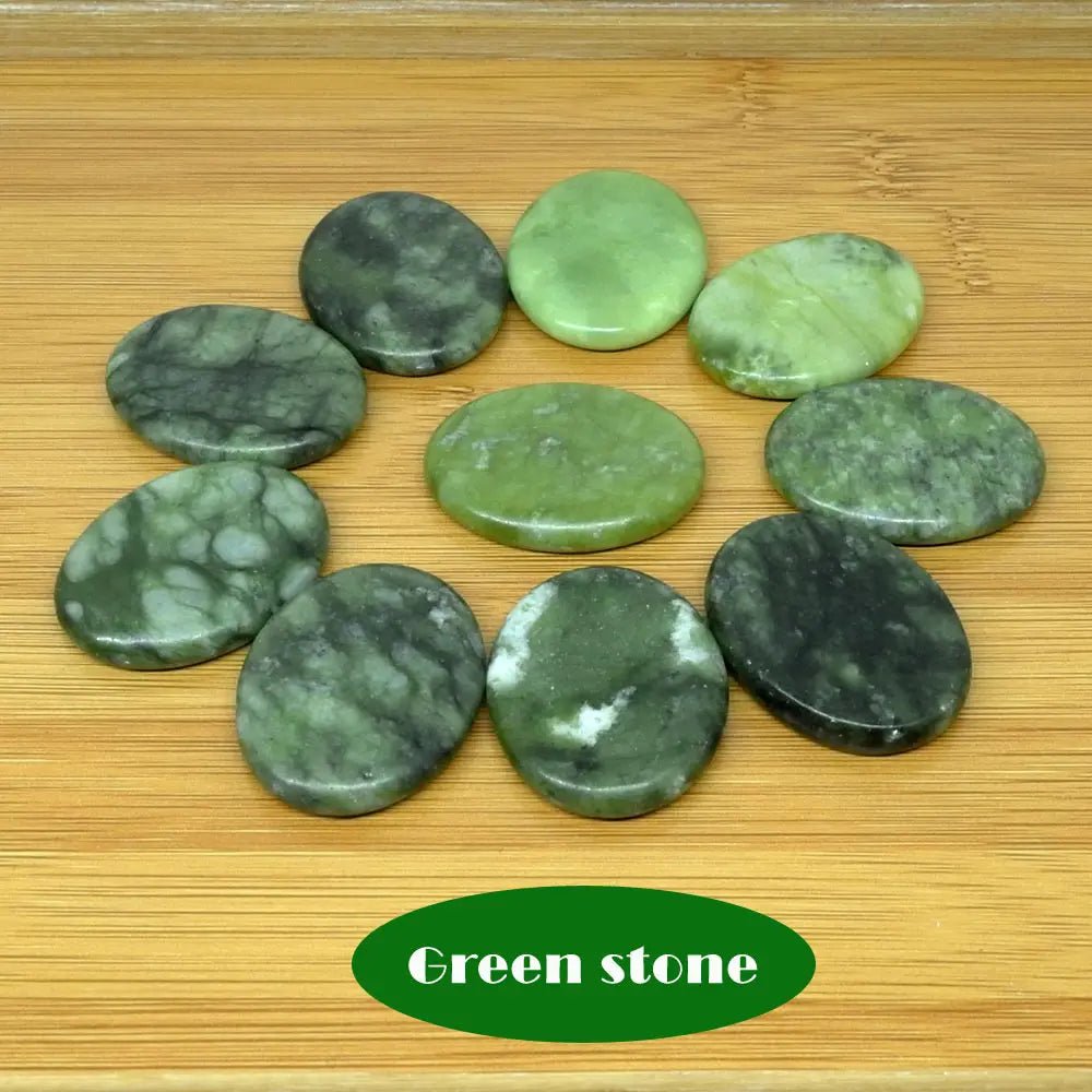 Massage therapy Jade Quarts Natural Stone set (10 Pieces 3 x 4 cm) picture of 10 light green stones offers with a table of wood in background