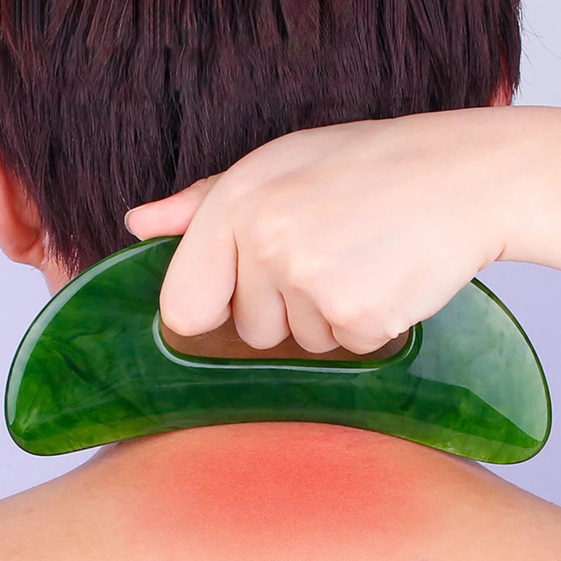Massage Therapy Natural Stone Massagers Tools for body, neck, head and back Picture of 1 green colour massager use on a lady neck by a professional