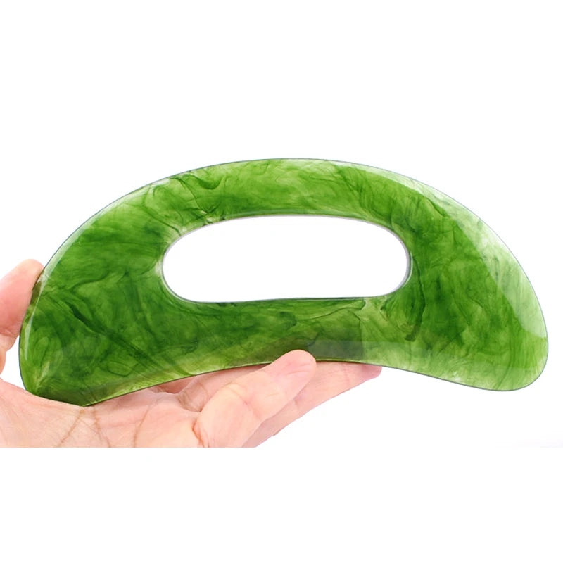 Massage Therapy Natural Stone Massagers Tools for body, neck, head and back Picture of a green tool held in left hand