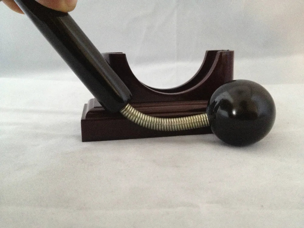 Massage therapy Sphere Black Jade Stone Hammer Tool Picture of the Hammer pressed to show the handle spring-loaded at the front of its base