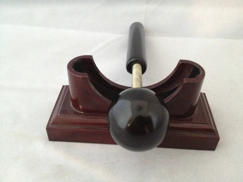 Massage therapy Sphere Black Jade Stone Hammer Tool Picture of the sphere Hammer leaning on the base in front of us