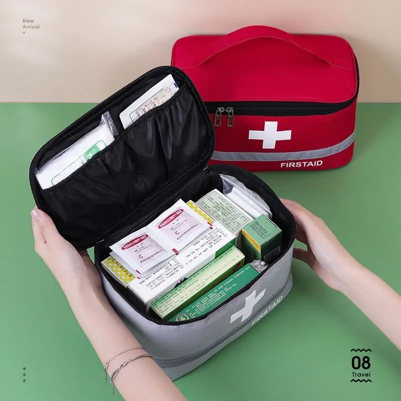 Medical Supplies Equipment First Aid 2 Kit Medicine Storage one red bag and the other is a gray colour bag all with the white cross in front and First Aid name on it.  The gray colour one is shown open with a lot of first aid stock, but this is not included in any offers, ONLY THE BAG is sent.