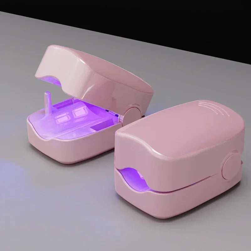 personal-health-care-two-pink-nail-fungus-device-in-use-picture