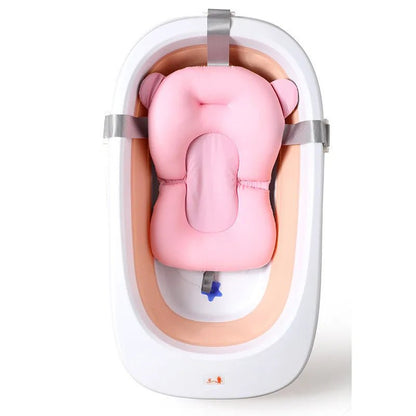 Wellness Foldable Baby Bath tub Seat Support Mat Pink Colour in a bath