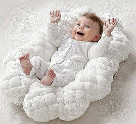 Baby Health Care, Picture of a baby happy lying under a comforter, Blog: Why does a baby need a comforter?