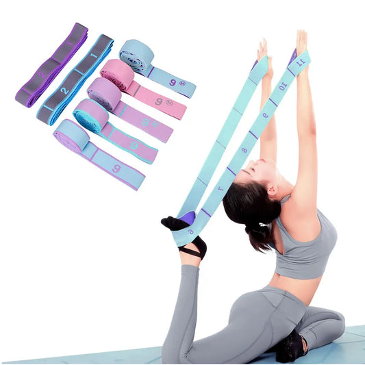 Fitness Yoga Multi-Section Elastic Resistance Bands Woman using a green colour band to stretch her back