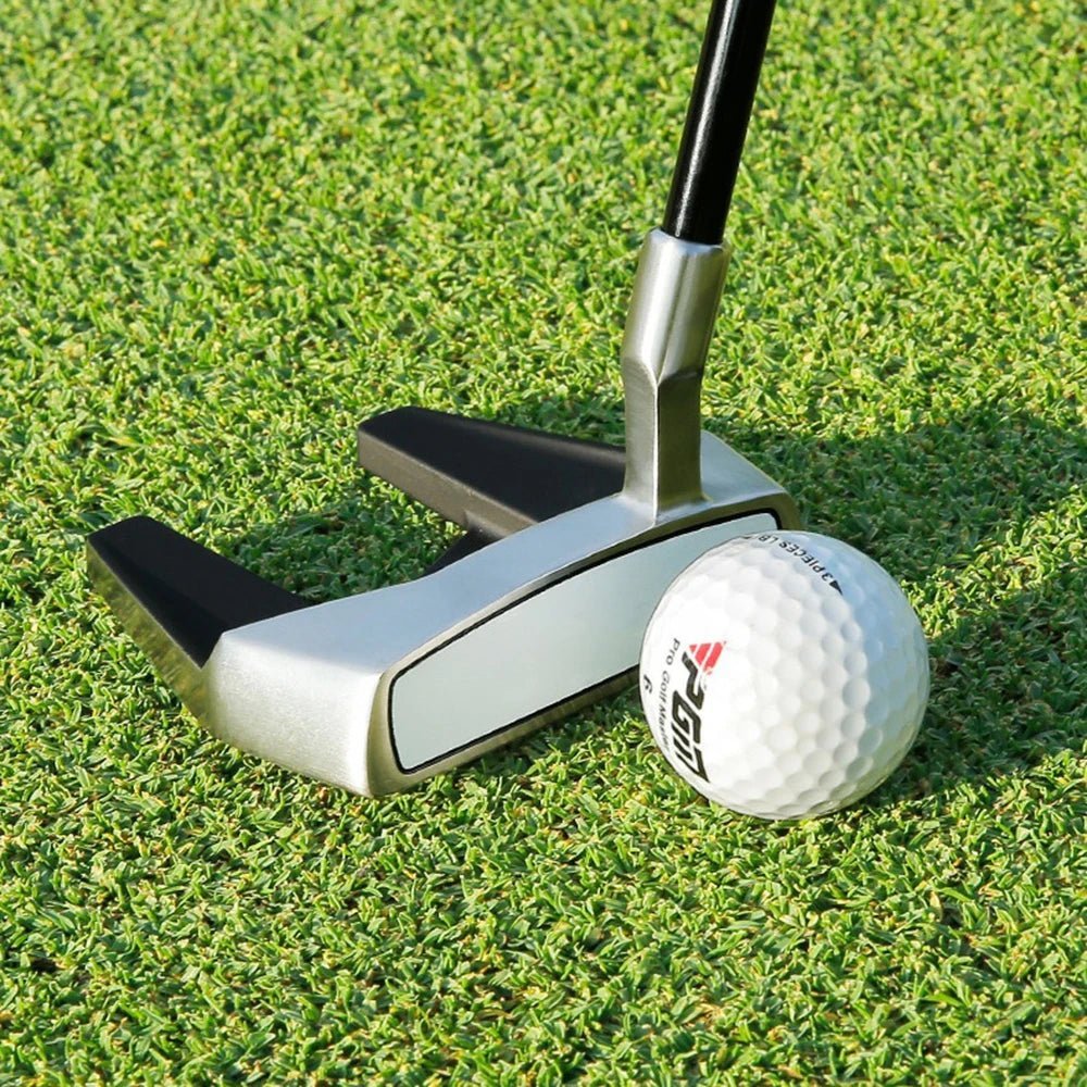 Golf Supplies & Equipment Golf Putter Ultra Low Centre of Gravity PGM Picture show the putter on the closely mown grass ready to put the ball on the green hole.