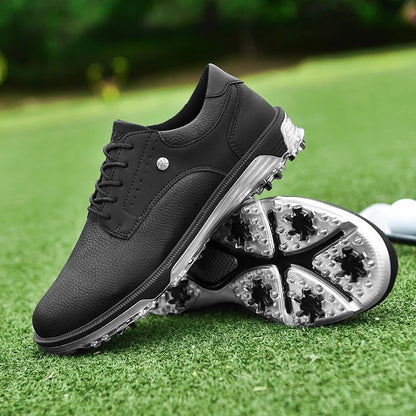 Golf Supplies & Equipment Golf Shoes Waterproof Non Slip Picture of Two Black Colour shoes balanced one on top of the other, placed on a closely mown lawn of a golf course with a club and ball in the back of the shoes