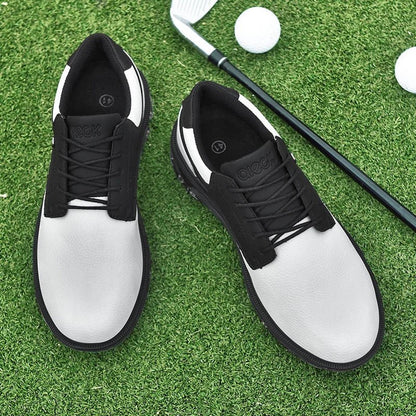 Golf Supplies & Equipment Golf Shoes Waterproof Non Slip Picture of Two white Colour shoes side by side placed on a closely mown lawn of a golf course with a club and two balls in the back near the shoes