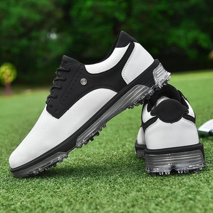 Golf Supplies & Equipment Golf Shoes Waterproof Non Slip. This picture show a pair of white and black colour shoes, one on top of the other, lie on closely mown grass of a golf course green. 