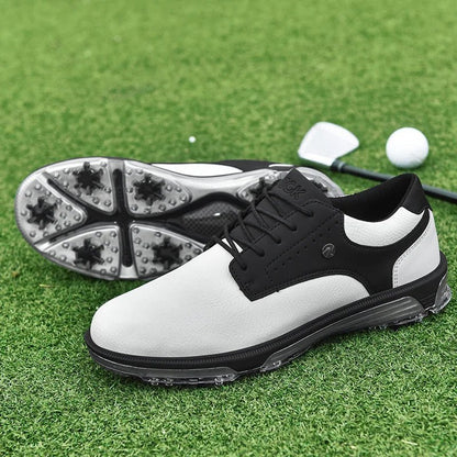Golf Supplies & Equipment Golf Shoes Waterproof Non Slip. This picture show a pair of white and black colour shoes, side by side, lie on closely mown grass, as they are on a golf course green. The studded sole of one of the shoes is visible; a golf club and two golf balls are located behind it.