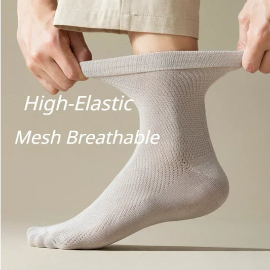 Health care products Antibiosis Socks for Men (96% Pure Cotton,5 Pairs) wear by man foot the 2 hands showing elastic socks