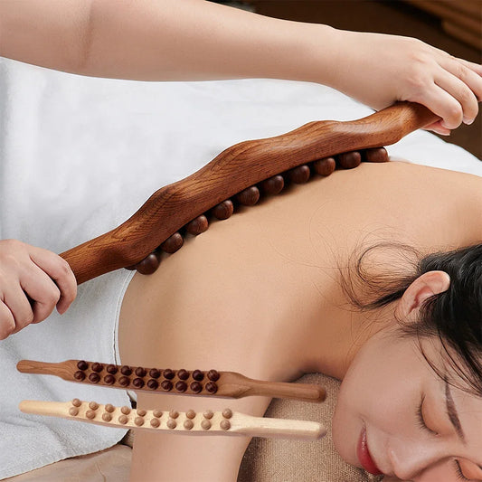 Massage Therapy 20 Beads Natural Wood Handheld Massager Therapy Stick Picture of a woman being massage with the wood tool.  Picture show also the white or brown wood Colour Offers