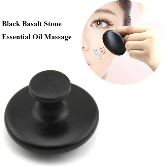 Massage Therapy Handmade Black Basalt Mushroom Stone Massager Picture of a lady use the product on her face with oil essential