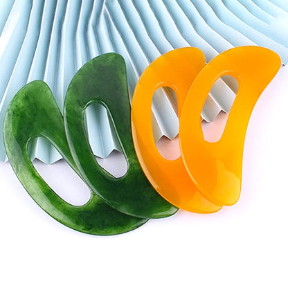 Massage Therapy Natural Stone Massagers Tools for body, neck, head and back Picture of 2 green colour massager and 2 orange one over a ligth green carton 