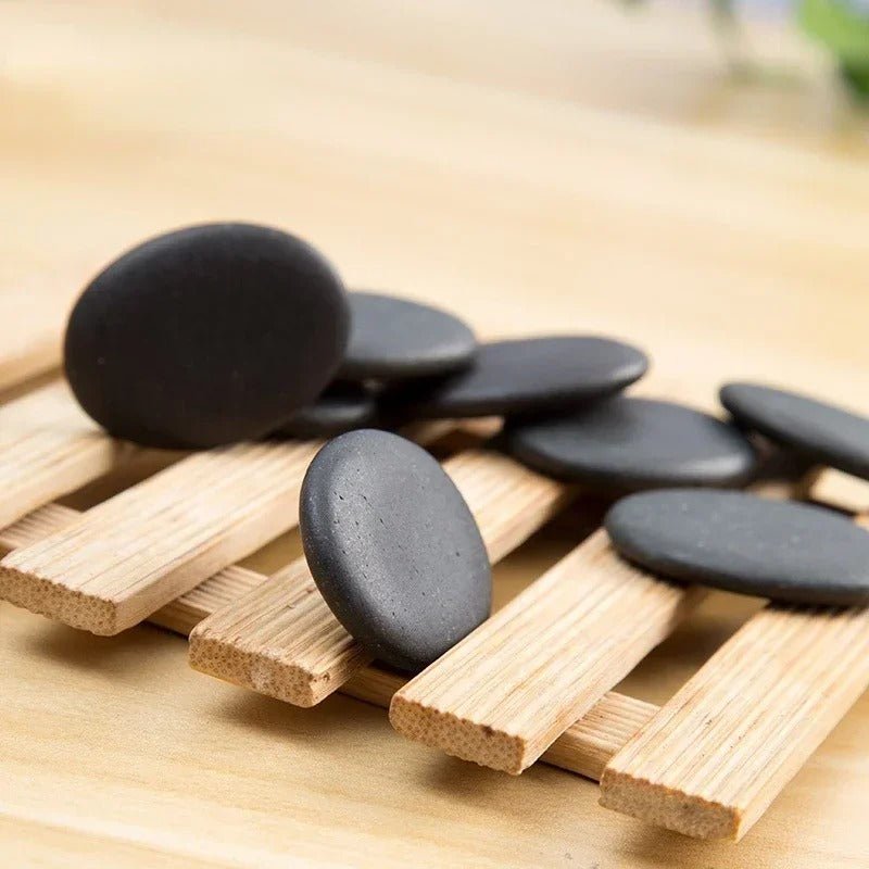 Massage therapy Natural Stone Set (7 pieces/set) 1 set shown on a wood cart
