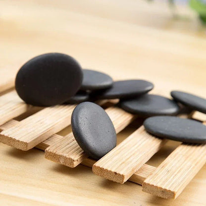Massage therapy Natural Stone Set (7 pieces/set) 1 set shown on a wood cart