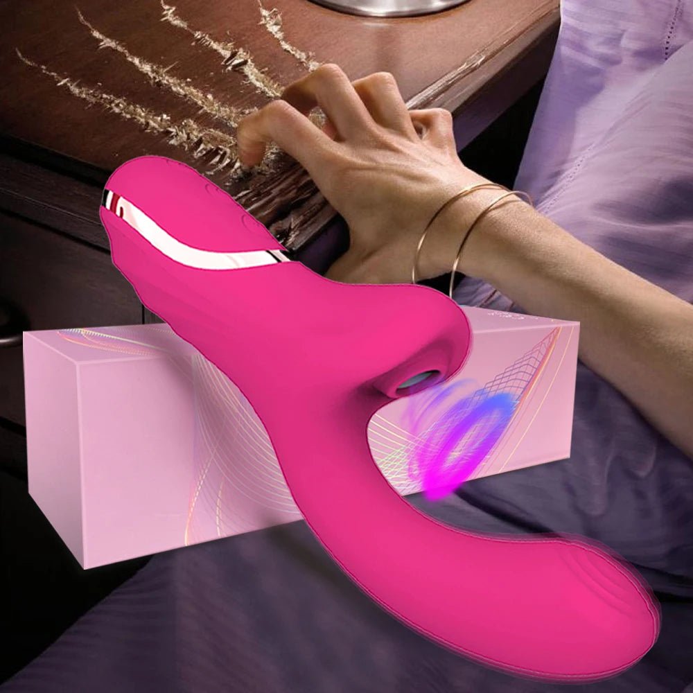 Wellness Clitoral Vibrator picture show a woman's hand scratching the top of a bedroom desk with her nails the pink colour vibrator, and it's storage box offers